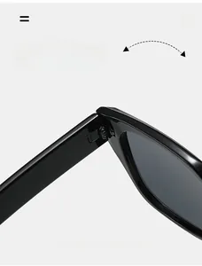 Macro detail of durable metal hinge on black glossy square oversized sunglasses