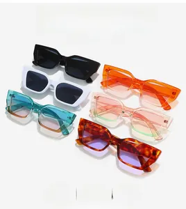 Flat lay of vintage rectangular sunglasses in various colors with thick PC frames