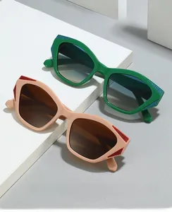 Macro view of stylish cat-eye sunglasses with colorful glitter detail on 2024 frame