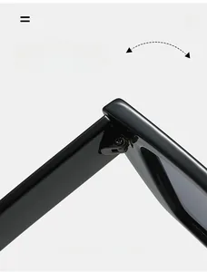 Detail of durable metal hinge on black cat-eye sunglasses with reinforced screw design