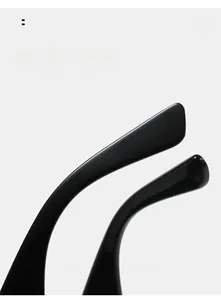 Close-up of curved glossy black sunglasses legs designed for ergonomic comfort wear