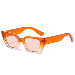 Retro transparent orange rectangle cat-eye sunglasses with y2k style lenses in 45-degree view