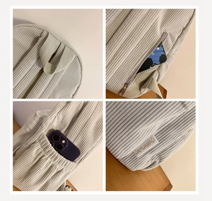 Detailed views of corduroy backpack featuring wide handle, anti-theft pocket and side pouch