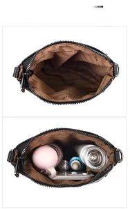 Detail view of large capacity multi-layer interior compartments with striped lining