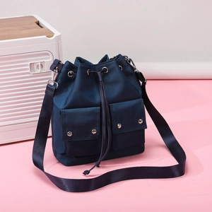 Large capacity navy blue nylon bucket bag with drawstring and detachable wide shoulder strap