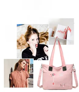 Pink corduroy tote bag with floral embroidery and adjustable leather straps details