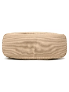 Detail view of the reinforced rectangular bottom of a beige corduroy tote bag