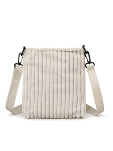 Detail of the corduroy fabric texture and durable plastic strap hook on the cream crossbody bag