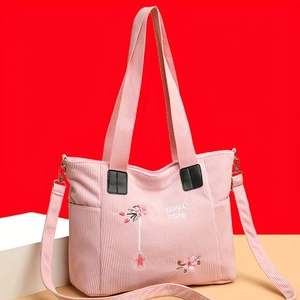 Pink corduroy tote bag with floral embroidery and adjustable strap for women