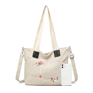 Corduroy tote bag with floral embroidery and adjustable strap, ivory white canvas feel