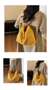 Verstellbare gelbe Cordtasche mit Details zu vielseitigen Schultergurt-Optionen