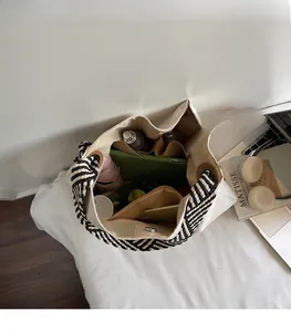 Top view of large canvas tote bag showing spacious compartments and storage capacity
