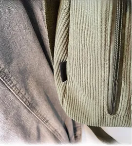 Détail macro du sac bandoulière en velours côtelé vert montrant la texture et l'étiquette