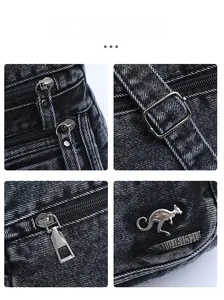 Detail view of black denim fabric texture with durable silver metal zippers and logo