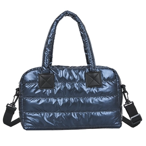 Metallic blue quilted tote bag with down padding and adjustable shoulder strap