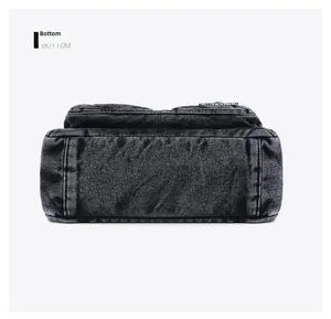 Detailed bottom view of the denim crossbody bag showing fabric texture and seams