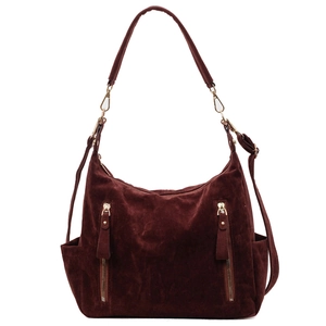 Large burgundy suede hobo shoulder bag with golden zippers and detachable straps