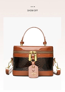 Detailed front view of vintage box bag in brown patchwork leather with gold hardware