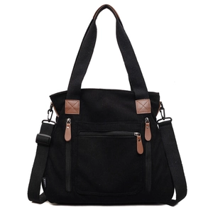 Grand sac fourre-tout en velours côtelé noir avec détails en cuir marron et bandoulière