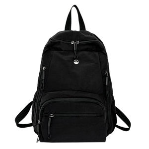 Classic black nylon backpack with multi-pocket design and high-capacity travel structure