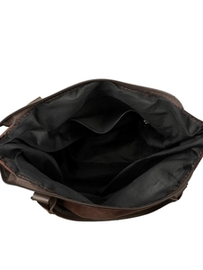 Interior view of the suede tote bag showing black lining with zippered pocket and compartments