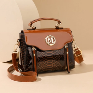 Brown snakeskin textured handbag with gold M logo and detachable shoulder strap