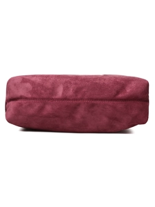 Detailed view of the burgundy suede tote bag showing reinforced stitching and base structure