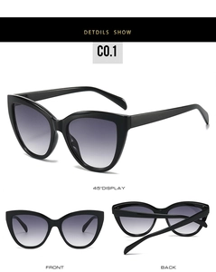 Detailed views of black cat-eye sunglasses with gradient lenses in three specific angles