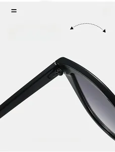 Macro shot of durable metal hinges on oversized cat-eye sunglasses with polished finish