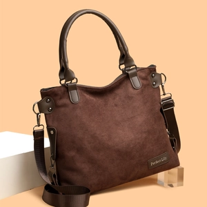Large dark brown suede tote bag with leather handles and wide strap for women