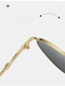 Close-up of durable golden metal hinges and screw details on retro oval sunglasses
