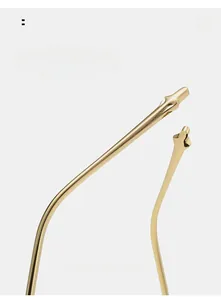 Detail view of curved golden metal sunglasses legs for comfortable wear and stylish fit