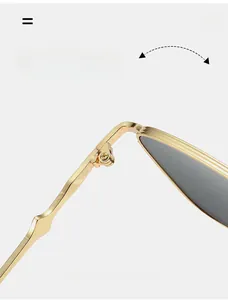 Detail of durable texture hinge on golden metal sunglasses for thousands of smooth folds