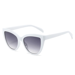Retro cat-eye sunglasses with thick white frames and gradient grey lenses for women
