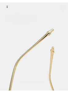 Macro detail of golden metal temples featuring ergonomic curved design for comfort wear