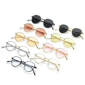 Retro oval sunglasses with slim metal frames and multi-color lenses in a matrix display