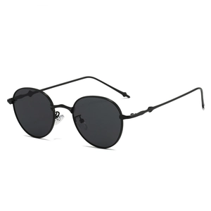 Classic black oval retro sunglasses with thin metal frames in a 45-degree angle view