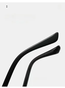 Détail macro des branches incurvées ergonomiques noires des lunettes de soleil