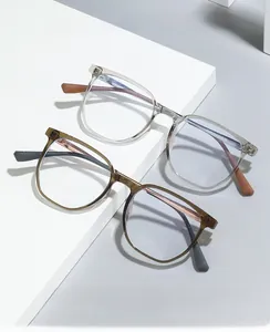 Detail view of TR90 irregular eyewear frames with anti-blue light lenses on a white display
