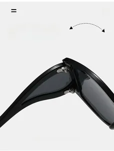 Detail des robusten Metallscharniers an der ovalen schwarzen Punk-Sonnenbrille für Damen