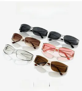 Detail of metallic hollow frame Y2K sunglasses with colorful gradient lenses in four pairs