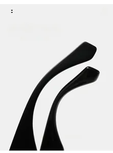 Close-up of curved ergonomic mirror legs on glossy black square sunglasses frames