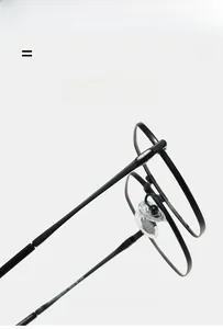 Detail of ultralight black titanium eyewear hinge and soft silicone nose pads