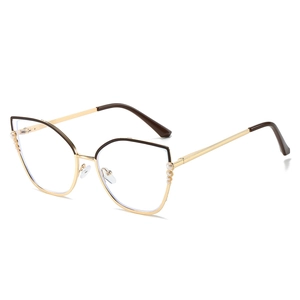Lunettes œil de chat chic en acier inoxydable doré avec accents de perles sur la branche