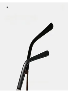 Detail view of black curved mirror legs and metal hinge for a comfortable sunglasses fit