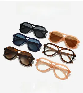 Detailed array of vintage oversized pilot sunglasses in various frame colors with dual bridge