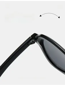 Detail of durable high-strength hinges on black oversized pilot sunglasses frame