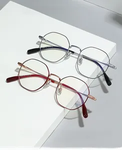 Macro detail of titanium IP polygon glasses frames showing premium plating texture