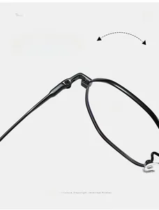 Close-up of durable textured hinges on ultra-light black titanium polygonal glasses frames