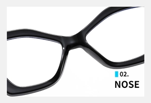 Macro view of the bridge and integrated nose pads on oversized black cat-eye glasses